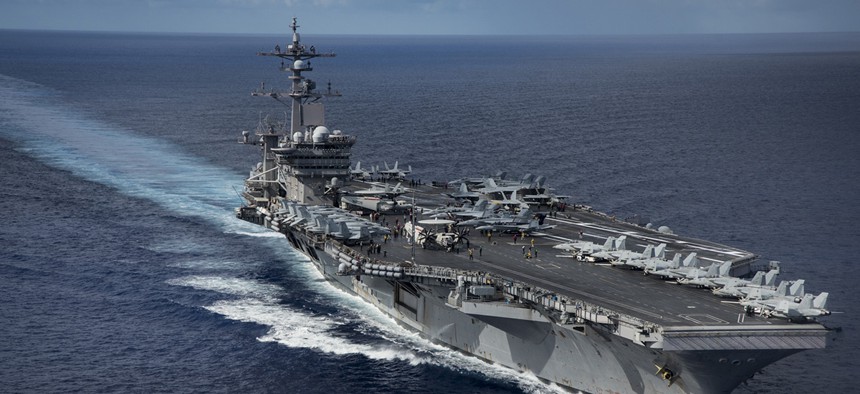 The Nimitz-class aircraft carrier USS Carl Vinson transits the Philippine Sea