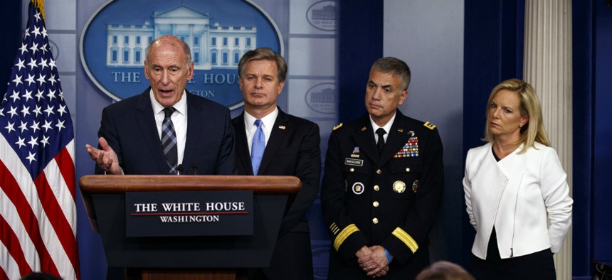 ODNI Dan Coats speaks during the daily press briefing at the White House Aug. 2, as FBI Director Christopher Wray, NSA Director Gen. Paul Nakasone, and Homeland Security Secretary Kirstjen Nielsen listen. 