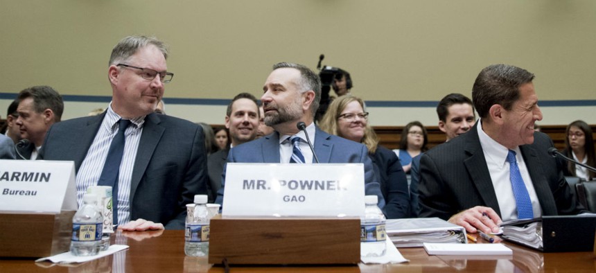 GAO’s Information Technology Management Issues Director Dave Powner (center) arrive to testify at a House Oversight and Government Reform Committee hearing on the 2020 Census May 8.