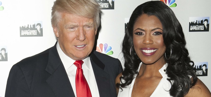Donald Trump and Omarosa Manigault attend the 'All-Star Celebrity Apprentice' Red Carpet Event at Trump Tower on April 1, 2013 in New York City.