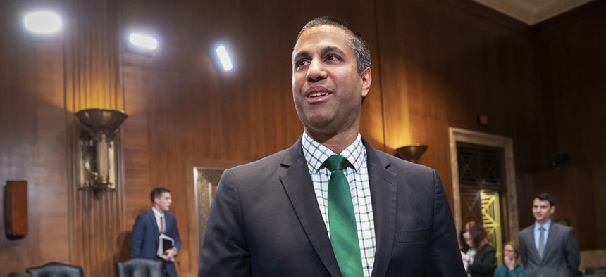 Ajit Pai, chairman Federal Communications Commission, prepares to testify on Capitol Hill.