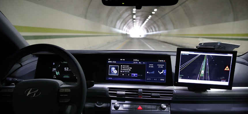 Hyundai's autonomous fuel cell electric vehicle Nexo is driven through a tunnel near the Pyeongchang Olympic Stadium in South Korea.