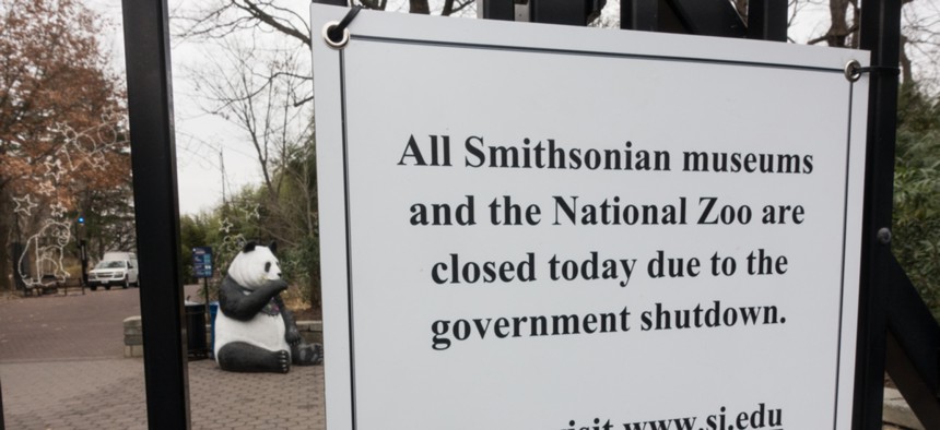 A sign at the National Zoo alerts would-be visitors, that the zoo and all Smithsonian Museums are closed because of the government shutdown.
