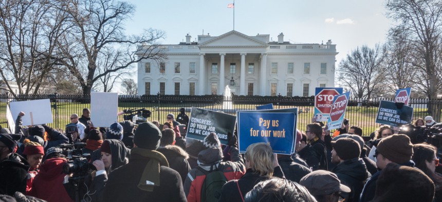 White House protest on Jan. 10 over government shutdown by furloughed as well as unpaid working federal employees, union members, contractors and supporters.