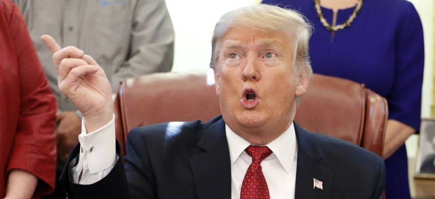 President Donald Trump speaks during a meeting with American manufacturers in the Oval Office of the White House Jan. 31.