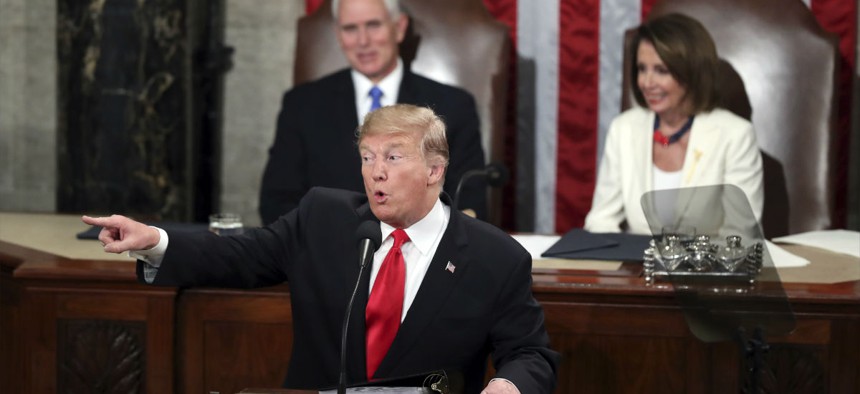President Donald Trump delivers the State of the Union address Feb. 5 to a joint session of Congress on Capitol Hill in Washington, as Vice President Mike Pence and Speaker of the House Nancy Pelosi watch.