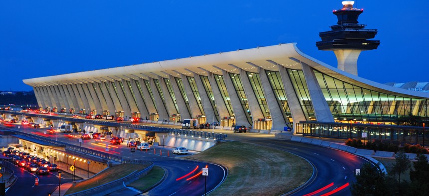 Traffic heads to Dulles International Airport’s main terminal in Virginia.