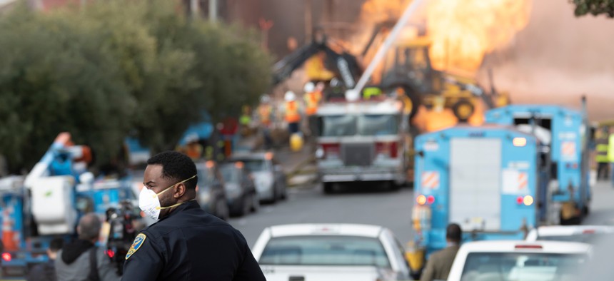 Firefighters battle a gas main blaze on Geary Blvd in San Francisco's Richmond District in February.