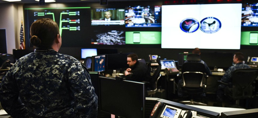 Sailors stand watch in the Fleet Operations Center at the headquarters of U.S. Fleet Cyber Command, a component of U.S. Cyber Command. 