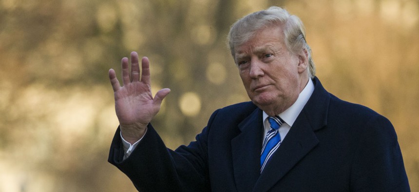 President Donald Trump waves as he walks on the South Lawn after stepping off Marine One at the White House, Sunday, March 10, 2019, in Washington.