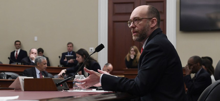 Office of Management and Budget acting Director Russell Vought testifies before the House Budget Committee March 12.