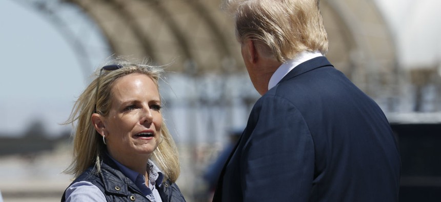 Homeland Security Secretary Kirstjen Nielsen greet President Donald Trump after he arrived on Air Force One at Naval Air Facility El Centro, in El Centro, Calif., April 5.