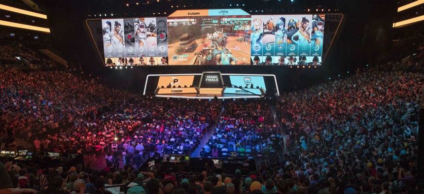 It takes hundreds of individuals to make a succesfull Esports event - what is the motivation behind such endeavor? Esports Uncovered will answer it for you! (credits: MARY ALTAFFE/AP)