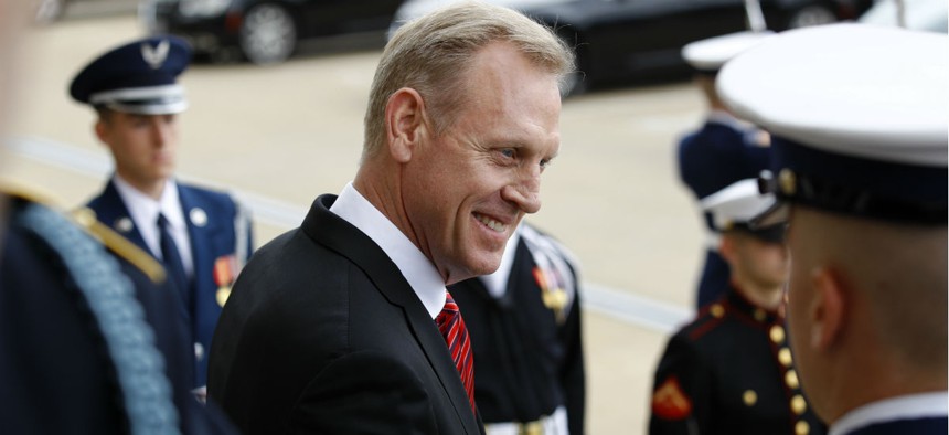 Acting Defense Secretary Patrick Shanahan speaks with reporters before an arrival ceremony for Japan's Defense Minister Takeshi Iwaya at the Pentagon April 19.