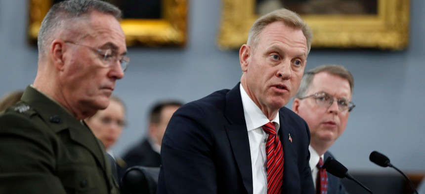Joint Chiefs of Staff Chairman Gen. Joseph Dunford, left, acting Defense Secretary Patrick Shanahan, and Acting Deputy Secretary of Defense David Norquist, testify to a House Appropriations subcommittee on budget hearing in May. 