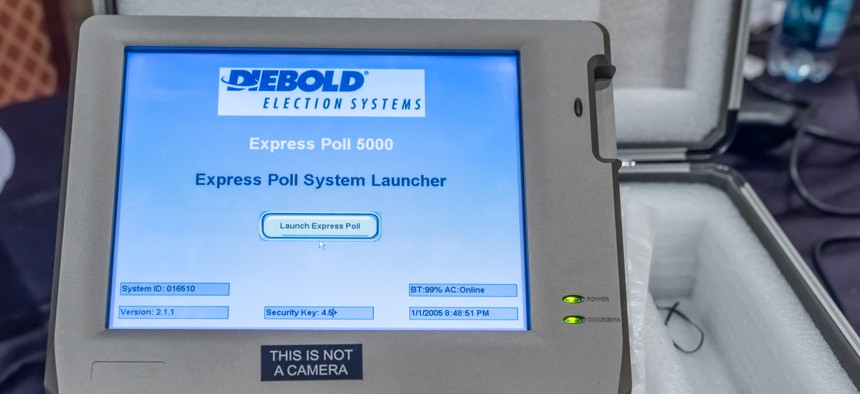 A hacked voting machine on display at DEFCON cybersecurity conference in 2017.