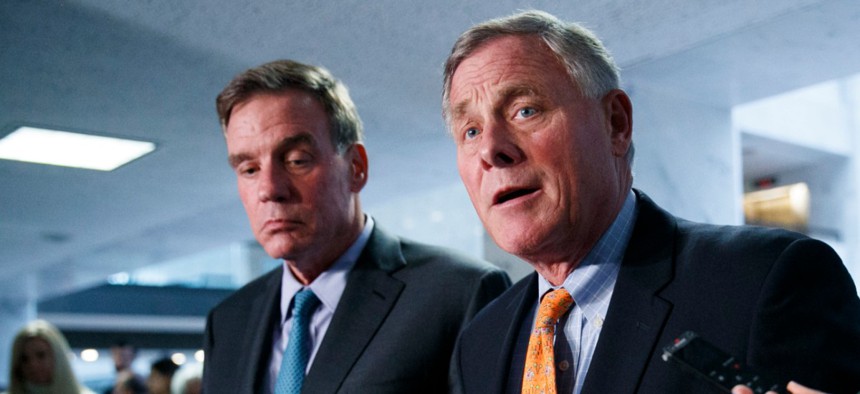 Senate Intelligence Committee Chairman Richard Burr (right) and Vice Chair Mark Warner