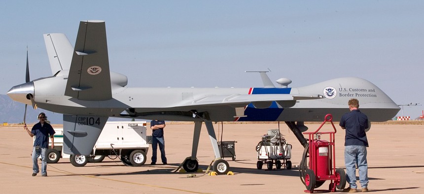 A Customs and Border Protection Predator gets its final check before a flight at Fort Huachuca Army base, in Sierra Vista, Ariz., Monday, Oct. 30, 2006. 