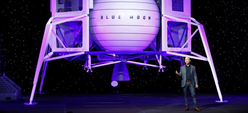 In May, Jeff Bezos speaks in front of a model of Blue Origin's Blue Moon lunar lander in Washington.