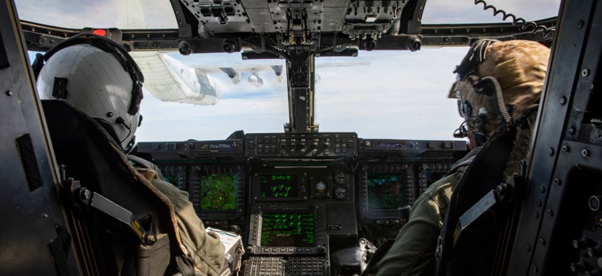 A MV-22B Osprey with Medium Tiltrotor Squadron VMM-263 prepares to receive fuel from a KC-130J Super Hercules from Marine Aerial Refueler Transportation Squadron 252 over the Atlantic Feb. 12, 2020.