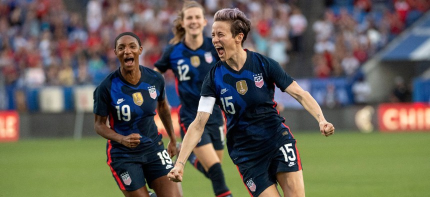 United States forward Megan Rapinoe (15) celebrates with defender Crystal Dunn (19) during a SheBelieves Cup women's soccer match March 11 in Frisco, Texas. 