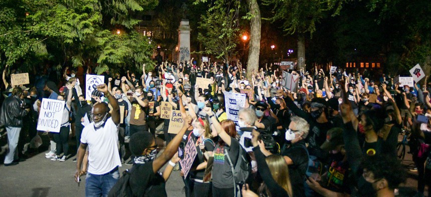 Black Lives Matter protest peacefully after federal officers scale back at Mark O. Hatfield United States Court House in Portland, Oregon on August 1.