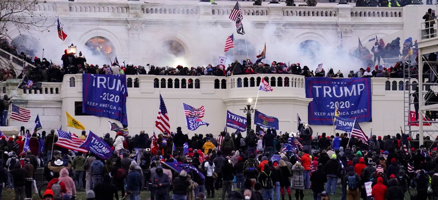 Violent protesters, loyal to President Donald Trump, storm the Capitol, Wednesday, Jan. 6, 2021, in Washington. 