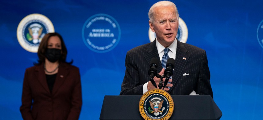 President Joe Biden answers questions from reporters in the South Court Auditorium on the White House complex Jan. 25.