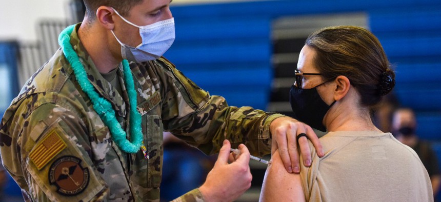 The Department of Defense’s Hickam 15th Medical Group hosts the first COVID-19 mass vaccination on Joint Base Pearl Harbor-Hickam in February, though many U.S. service members are refusing or putting off the COVID-19 vaccine.