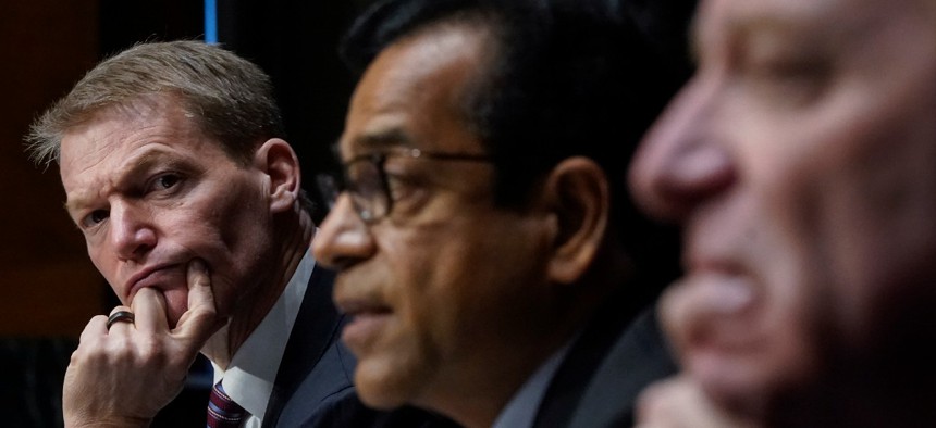 FireEye CEO Kevin Mandia, SolarWinds CEO Sudhakar Ramakrishna and Microsoft President Brad Smith testify during a Senate Intelligence Committee hearing Feb. 23.