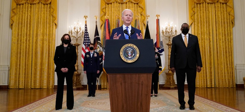 President Joe Biden speaks during an event to mark International Women's Day March 8 in the East Room of the White House.