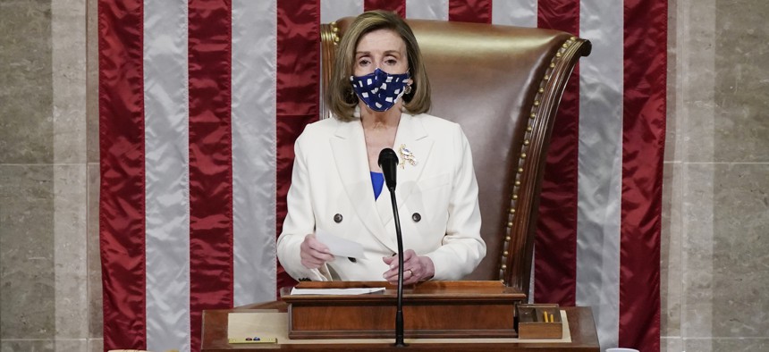 Speaker of the House Nancy Pelosi, D-Calif., leads the vote to approve a landmark $1.9 trillion COVID-19 relief bill, at the Capitol in Washington, Wednesday, March 10, 2021.