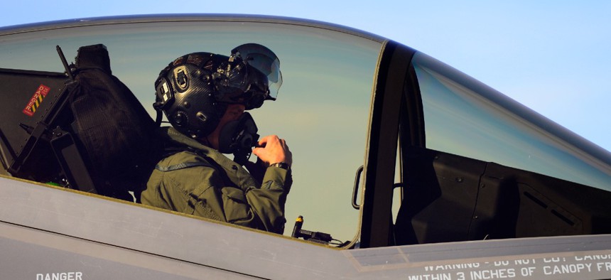 A test pilot goes through his pre-flight checks before flying an F-35A at Hill Air Force Base, Utah.