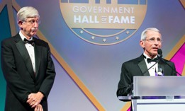 Dr. Anthony Fauci accepts his induction into the Government Hall of Fame in 2019 alongside NIH director Francis Collins.