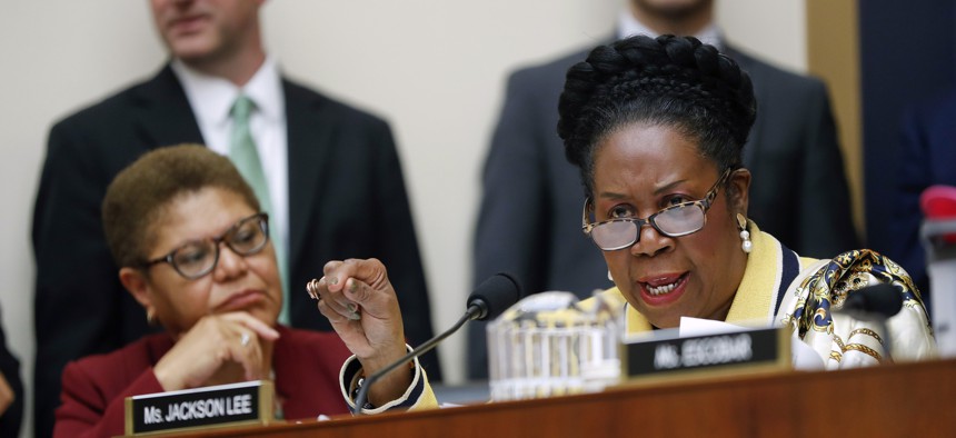 In this June 19, 2019, file photo Rep. Sheila Jackson Lee, D-Texas, right, speaks during a hearing about reparation for the descendants of slaves before the House Judiciary Subcommittee on the Constitution, Civil Rights and Civil Liberties, at the Capitol in Washington.