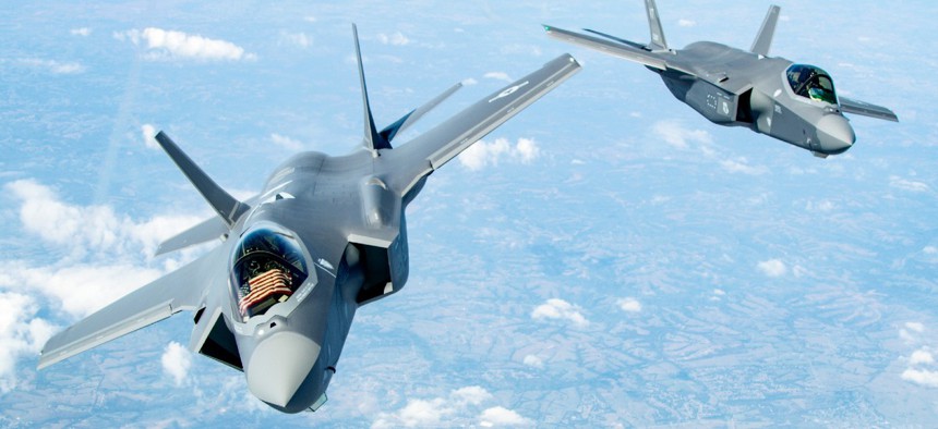 Two F-35 Lightning II’s bank after receiving fuel over the Midwest Sept. 19, 2019. 