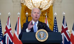 President Joe Biden, joined virtually by Australian Prime Minister Scott Morrison and British Prime Minister Boris Johnson, speaks about a national security initiative Sept. 15.