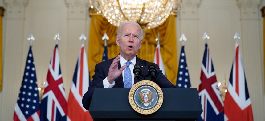 President Joe Biden, joined virtually by Australian Prime Minister Scott Morrison and British Prime Minister Boris Johnson, speaks about a national security initiative Sept. 15.