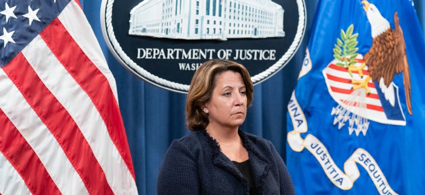 Deputy Attorney General Lisa Monaco stands during a news conference at the Department of Justice, Thursday, Sept. 30, 2021, in Washington.