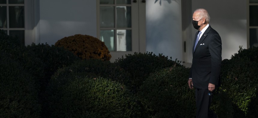 President Joe Biden walks to the Oval Office after arriving on the South Lawn of the White House Nov. 8.