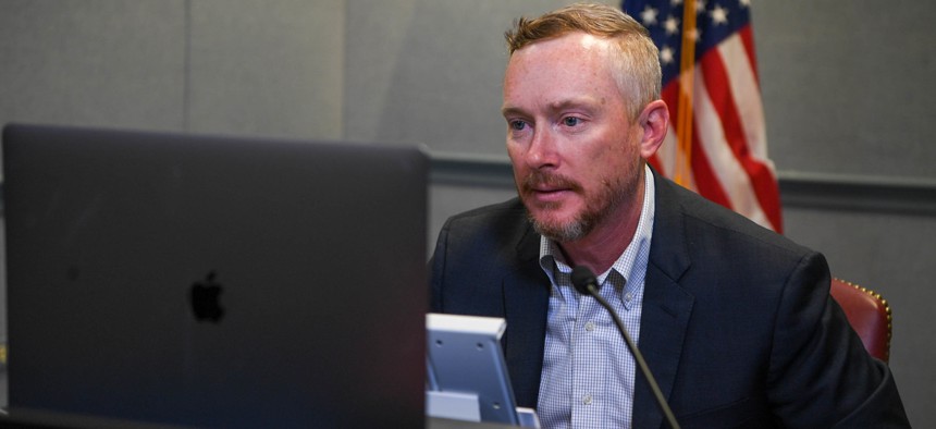 Department of Defense Chief Data Officer David Spirk speaks via videoconference to children at Mitchell Elementary School in Tampa, Fla. 