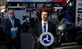 Transportation Secretary Pete Buttigieg speaks during an electric vehicles event outside of the agency’s Washington headquarters in October.