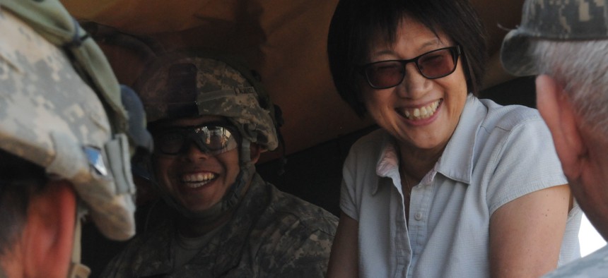 Heidi Shyu, the assistant secretary of the Army for Acquisition, Logistics and Technology, shares some laughs with the Soldiers of 4th Battalion, 27th Field Artillery Regiment, 2nd Brigade Combat Team, 1st Armored Division, during Network Integration Evaluation 15.2 on May 13.
