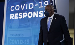 WASHINGTON, DC - JANUARY 13: U.S. Secretary of Defense Lloyd Austin arrives for a meeting with U.S. President Joe Biden on the administration's response to the surge in COVID-19 cases across the country from the South Court Auditorium in the Eisenhower Executive Office Building on January 13, 2022 in Washington, DC. 