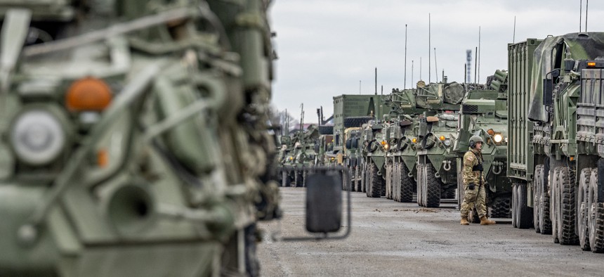 Military vehicles of the U.S. Army stand on the grounds of the Grafenwoehr military training area on Feb 9, 2022.