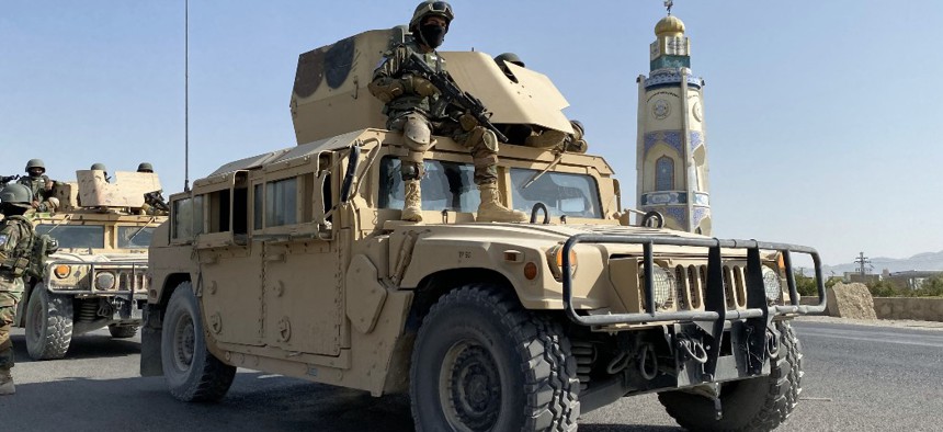 Taliban holds a military parade with equipment captured from U.S. army in Kandahar, Afghanistan on November 8, 2021.