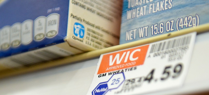 Items approved for the WIC program are labeled on a store shelf. 