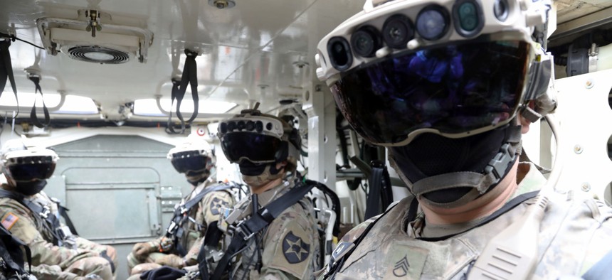 Soldiers wear the Integrated Visual Augmentation System Capability Set 3 hardware in Joint Base Lewis-McCord, Wash.
