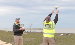 In this photo taken Feb. 25, 2019, NTSB investigators launch a drone to survey debris field of the Feb. 23, 2019, cargo jet crash in Texas.
