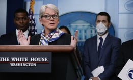 Energy Secretary Jennifer Granholm (C) speaks during a news conference marking six months since the signing of the bipartisan infrastructure bill with (L-R) Environmental Protection Agency Administrator Michael Regan, National Economic Council Director Brian Deese and Transportation Secretary Pete Buttigieg in the Brady Press Briefing Room at the White House on May 16, 2022 in Washington, DC. The Biden Administration cabinet members highlighted what they considered the successes of the infrastructure law.